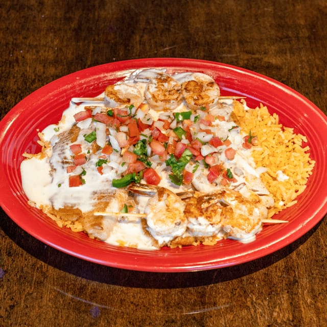 Tilapia Con Arroz.